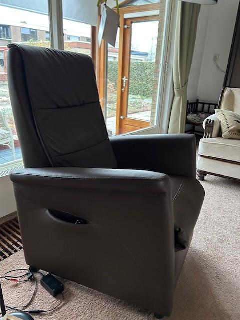 Sta-Op-Stoel leder zo goed als nieuw