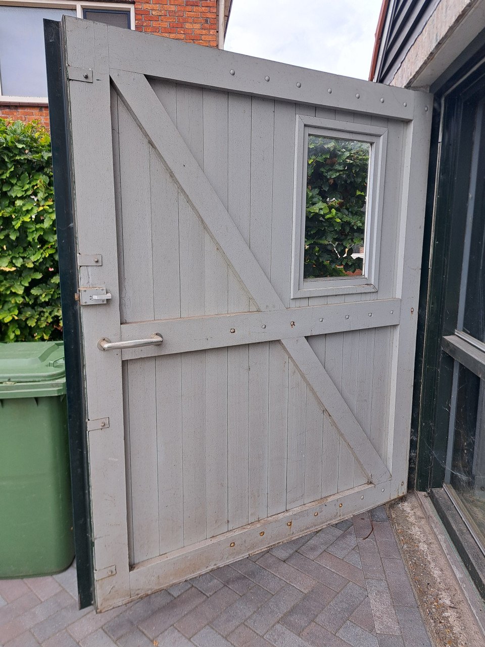 Hardhouten garage deuren