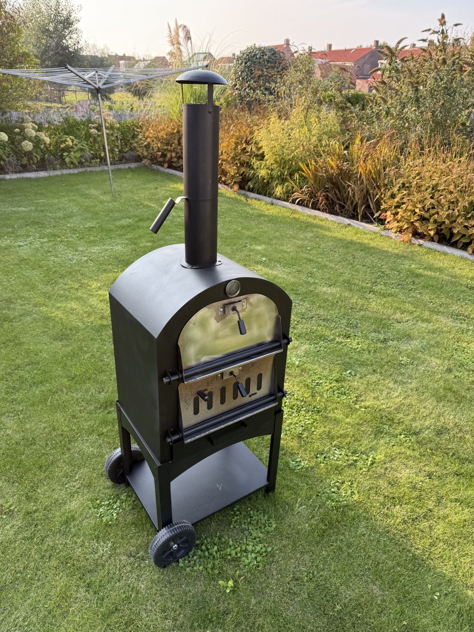 Pizzaoven (BBQ) en terraskachel