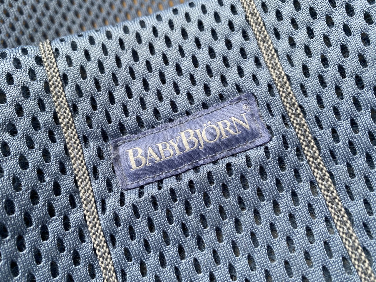 BabyBjorn wipstoeltje met houten speeltjes
