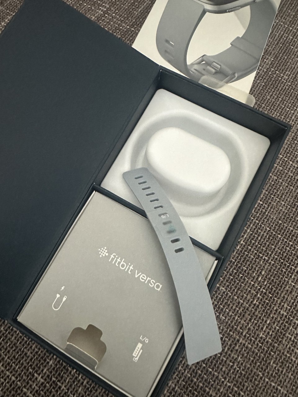Fitbit Versa met grijs bandje