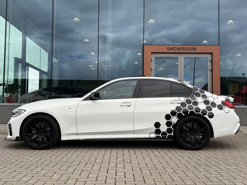 BMW 3-serie 320i m-sport | schuifdak | acc | leder | memory | laser | 20 in