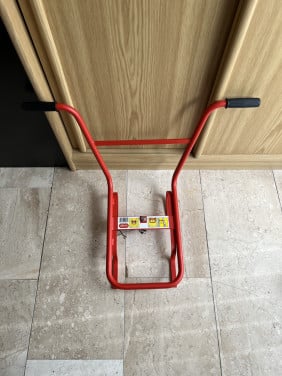 Muurafstandhouder voor een ladder