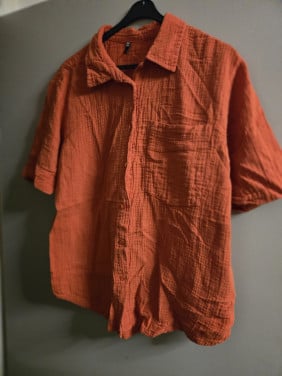 Setje van oranje blouse en short Hema Maat L  Krinkelstof 100% katoen