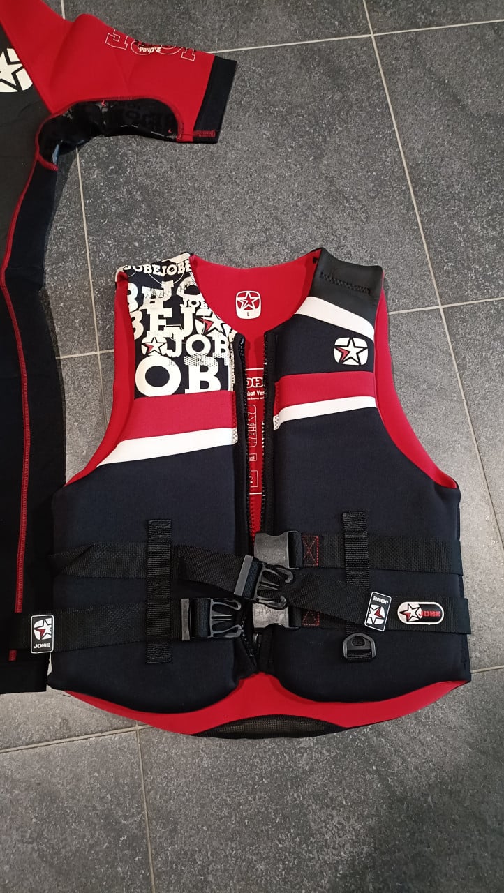 Te koop surfpak + zwemvest