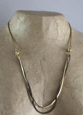 Goudkleurige ketting met zilver en brons