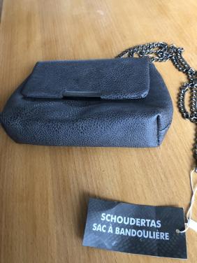 Te koop leuk grijs tasje.(nieuw).