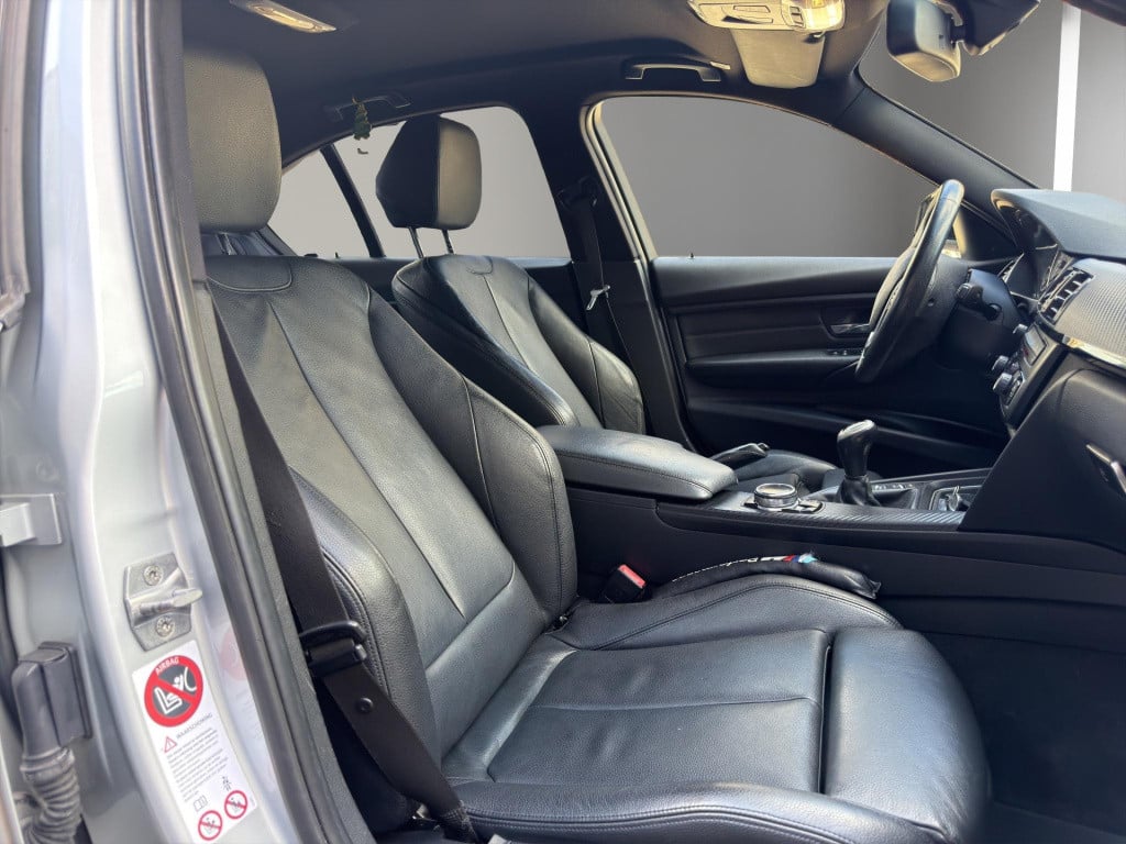BMW 3-serie 320d high executive leder pdc