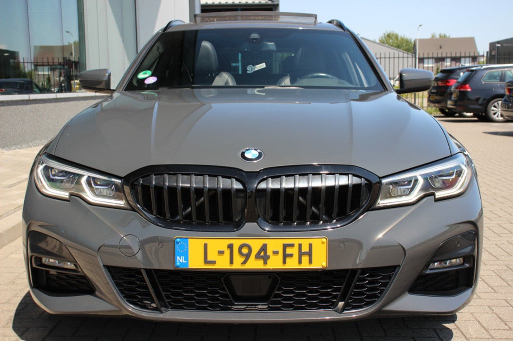 BMW 3-serie touring 320i high executive m pakket | pano | laser | leder