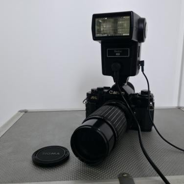 Canon A1 Spiegelreflexcamera met complete set accessoires
