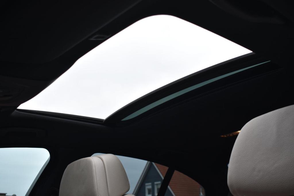 BMW 5 Serie 520i m sport | schuifdak | camera | leder | nap | adapt. cruise