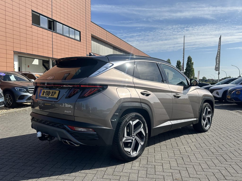 Hyundai Tucson 1.6 t-gdi phev premium 4wd | trekhaak | vol-leder | adapt. c