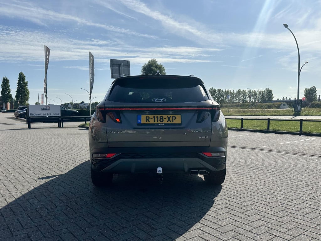 Hyundai Tucson 1.6 t-gdi phev premium 4wd | trekhaak | vol-leder | adapt. c