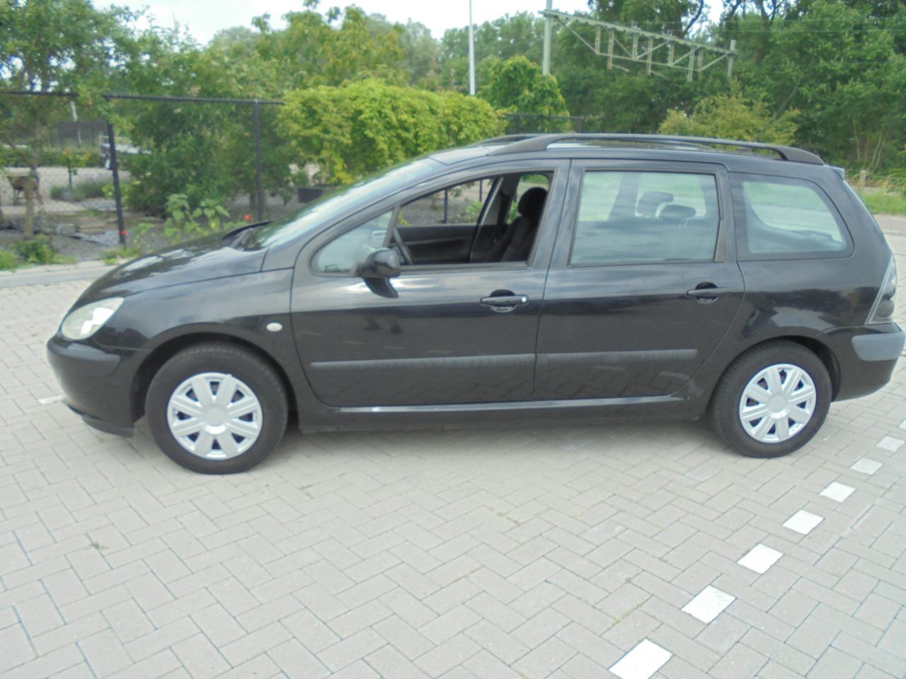 307 1.4 I  - 16V Break uit het bouwjaar 2005 met Apk en N.A.P