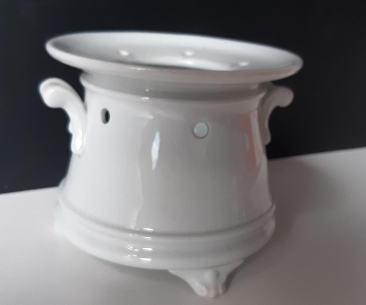 Petrus Regout wit theelicht op pootjes met vetschuitje