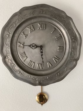Tinnen wandbord klok