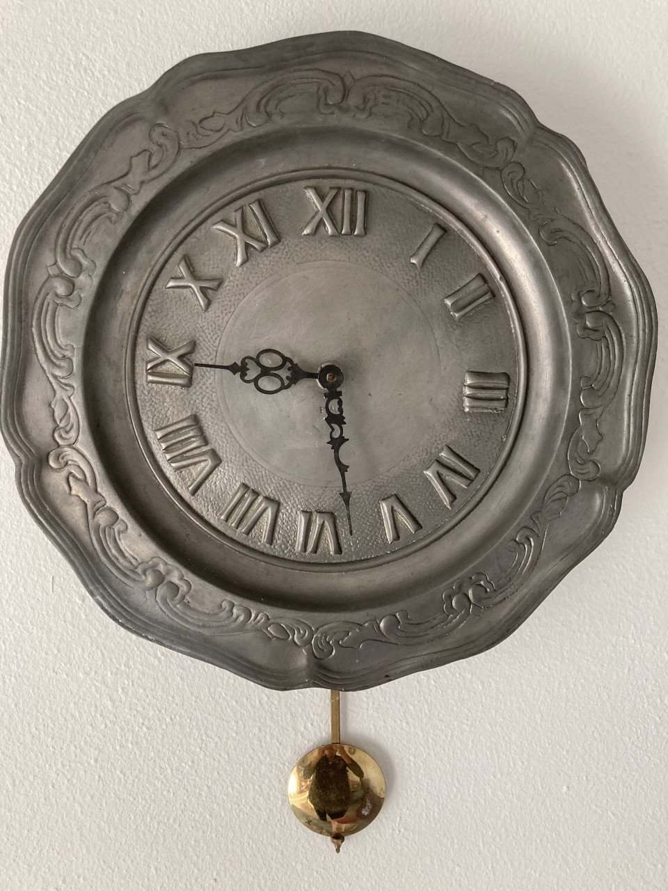 Tinnen wandbord klok