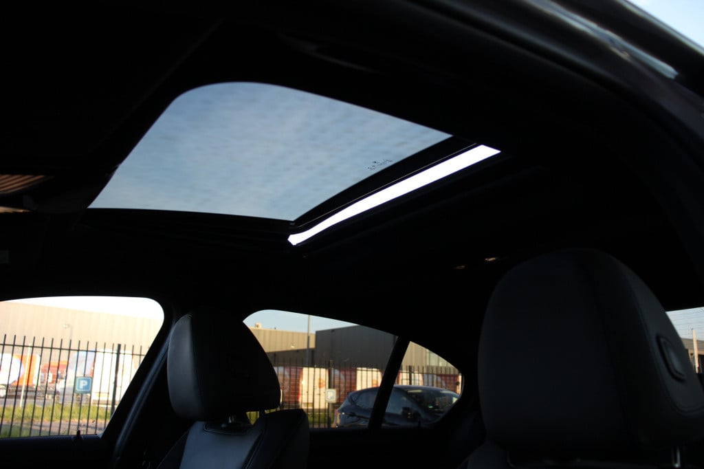 BMW 3-serie 330e high executive m-sport | schuifdak | laser | h&k | el. sto