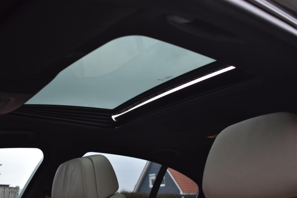 BMW 5 Serie 520i m sport | schuifdak | camera | leder | nap | adapt. cruise