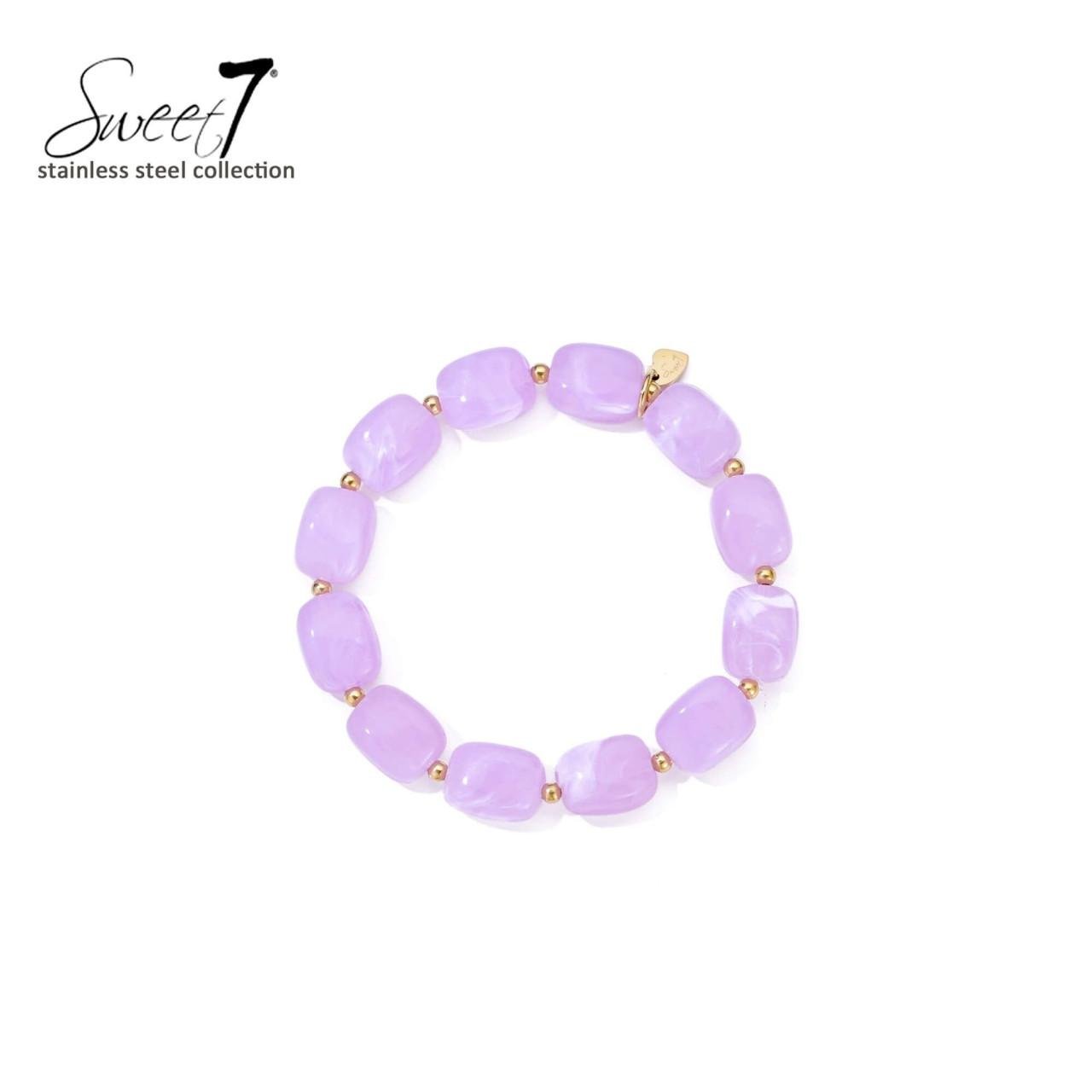 Armband met paarse en goudkleurige kralen