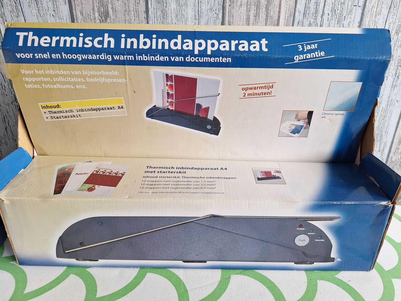 Inbindapparaat met inbindmappen