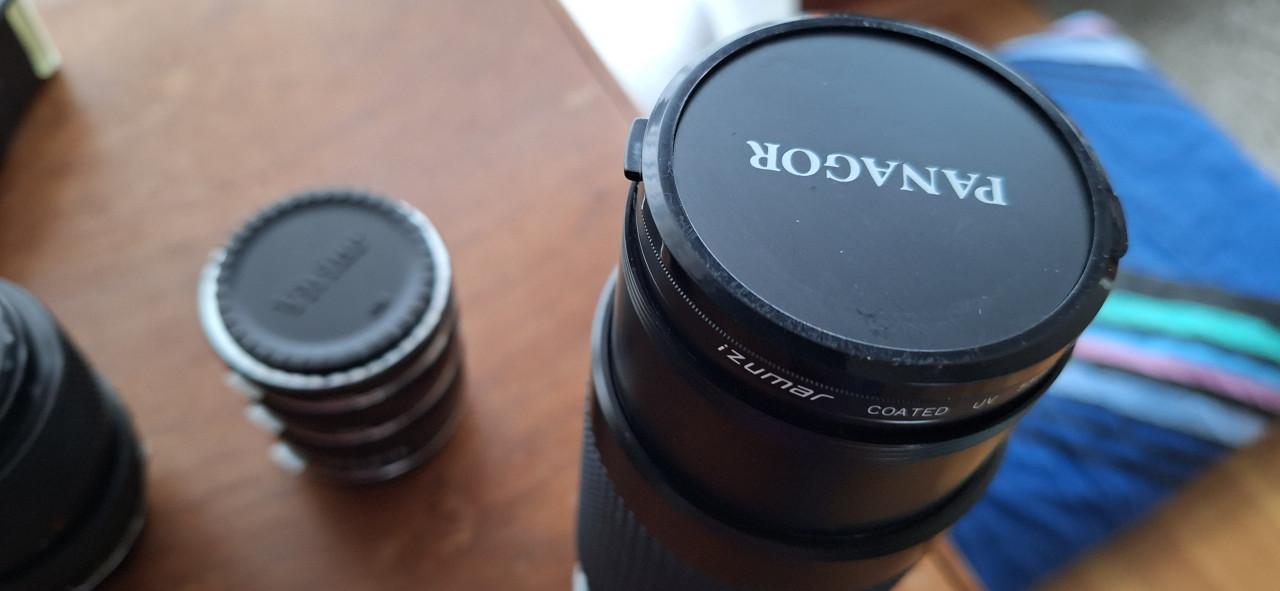 Olympus spiegelreflex camera (OM40) met diverse mooie lenzen