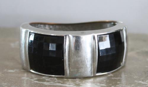 Zilverkleurige klem armband met zwart