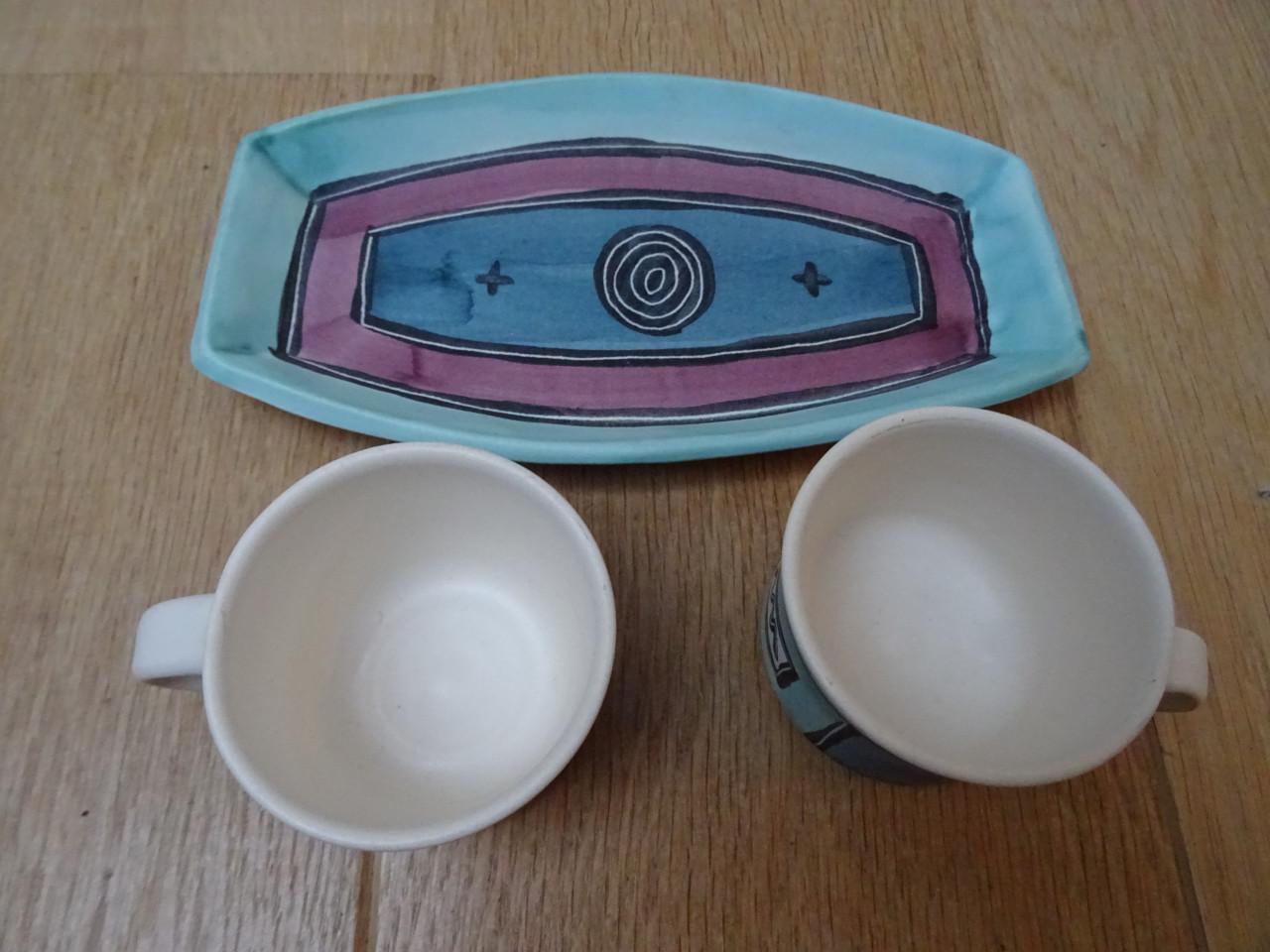 Bijzondere designkopjes op plateautje