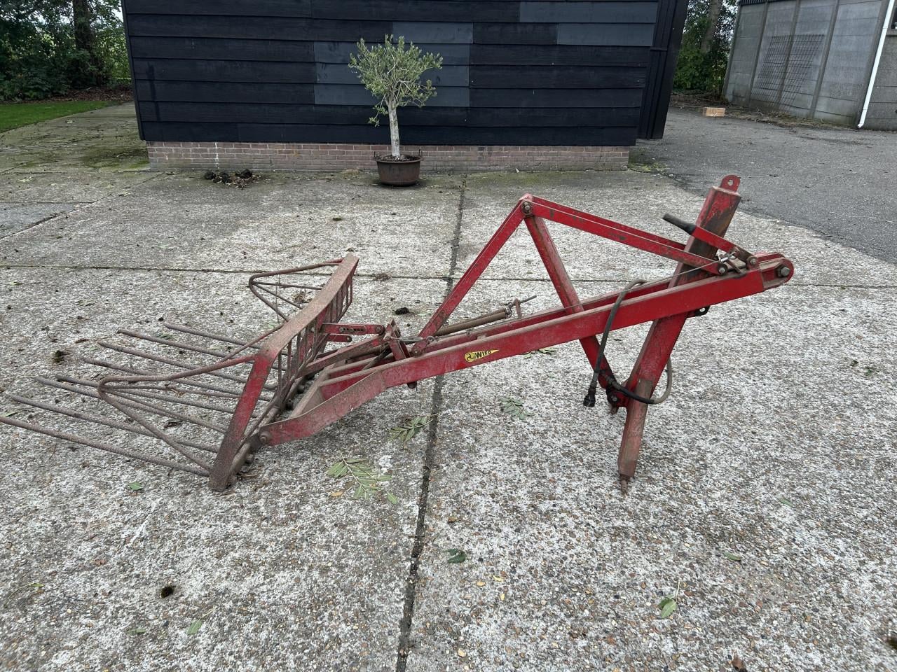 Achterlader met mestvork