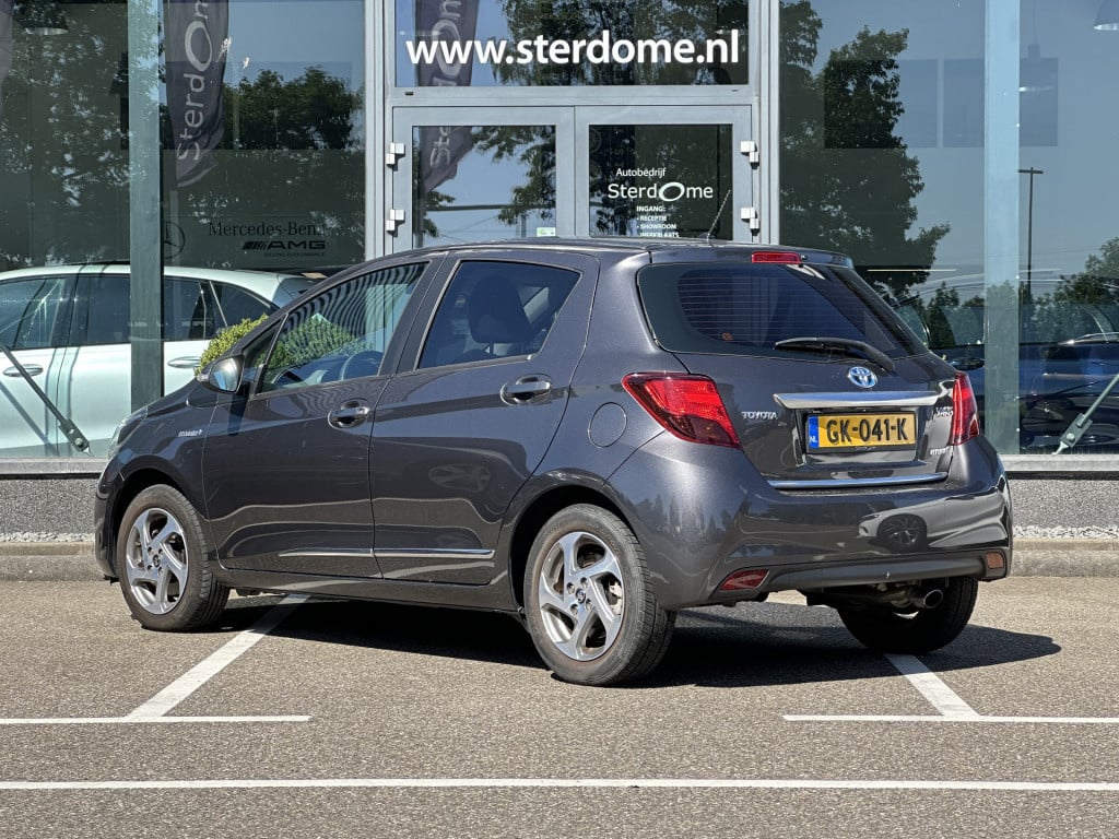 Toyota Yaris 1.5 hybrid lease i camera i automaat i airco l navigatie i zee
