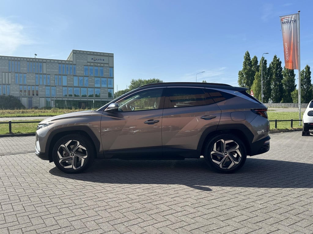 Hyundai Tucson 1.6 t-gdi phev premium 4wd | trekhaak | vol-leder | adapt. c