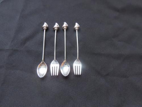 Vorkjes en lepeltjes schelpen verzilverd