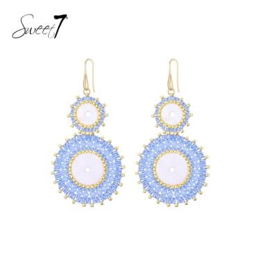 Oorbellen blauw met ronde kralen en goudkleurige details