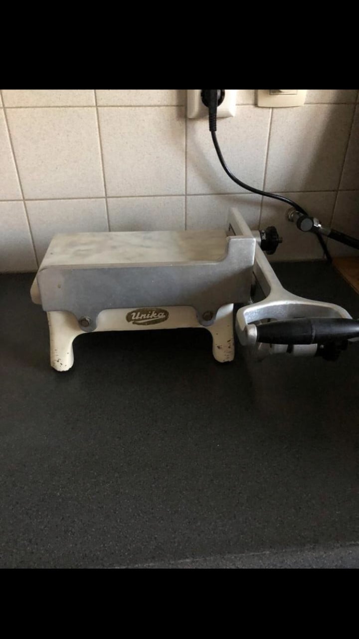 Unika kaassnijmachine