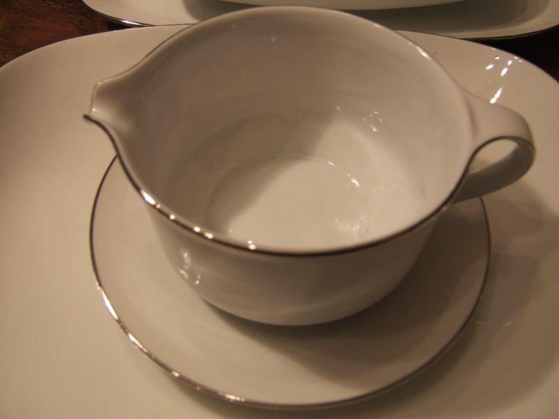 Wit kerst servies met zilveren rand