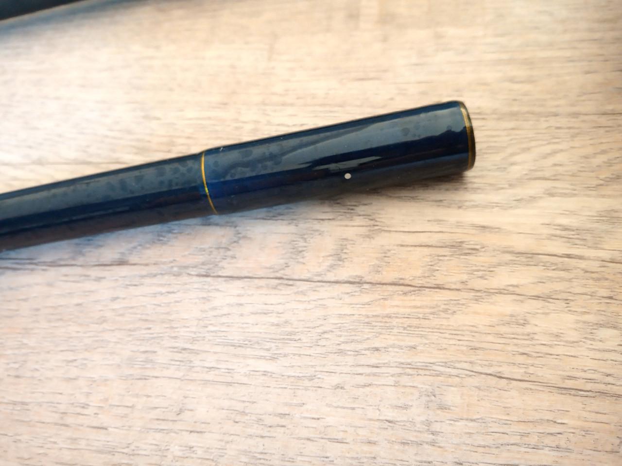 Te koop z.g.a.n. 2 delig strandhengel voor reel