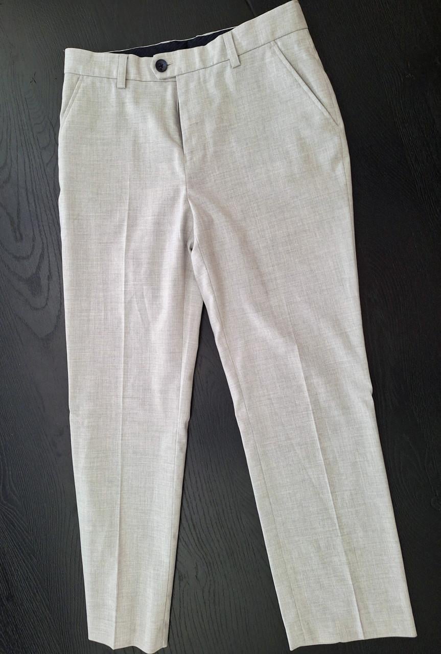 Lichtgrijze pantalon en colbert set maat 152 van Next
