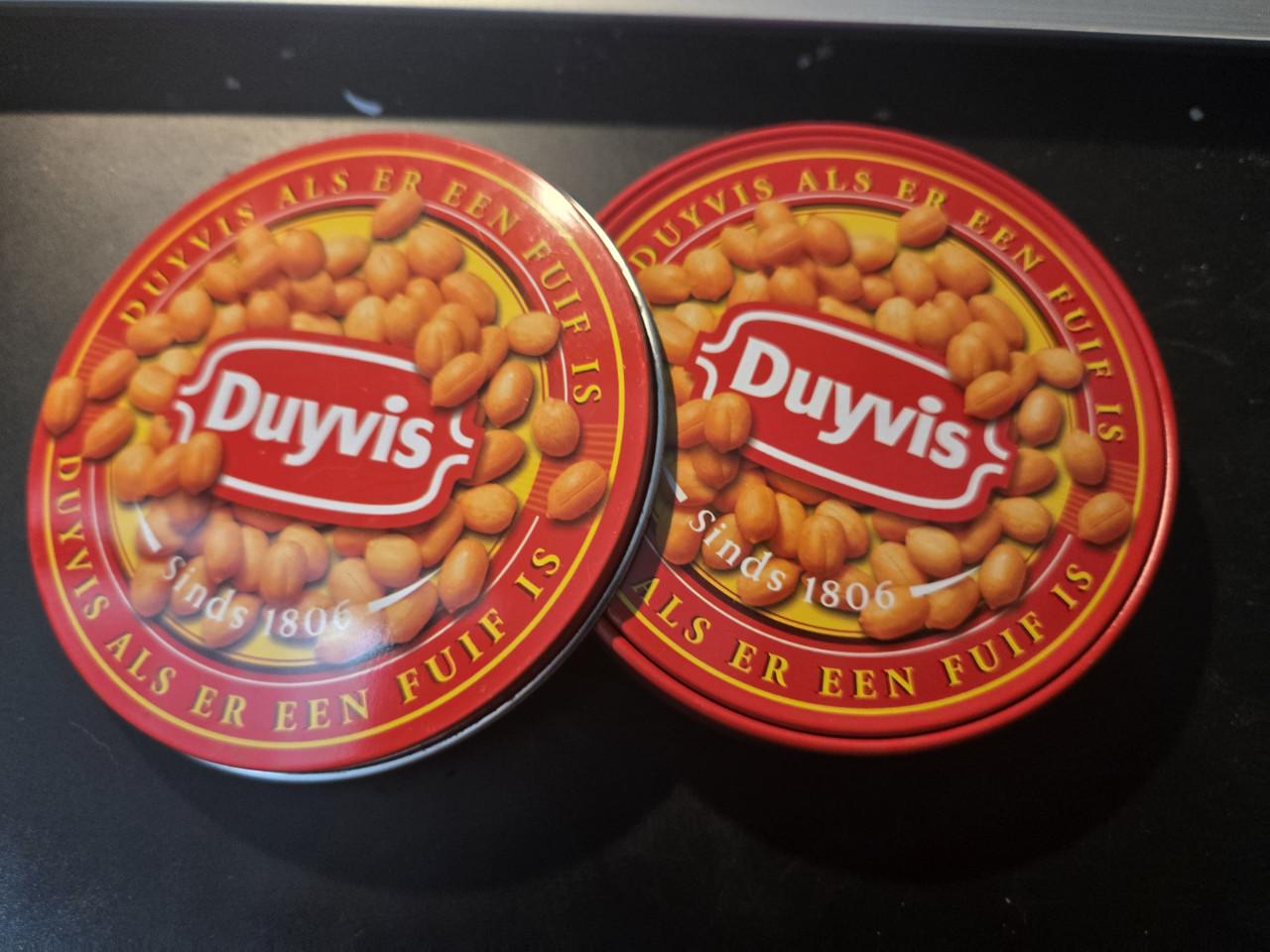 Blikje met 4 onderzetters van het merk Duyvis Ø 9.5cm