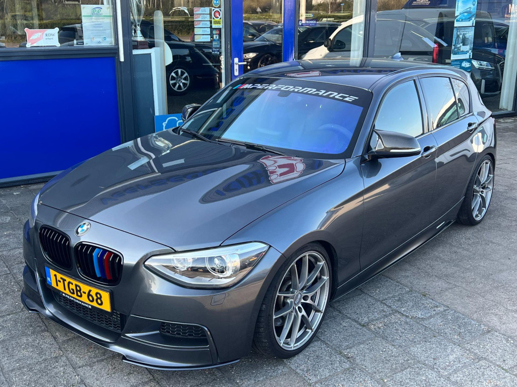 BMW 1 Serie m135i xdrive high executive, customized, stage 2 437 pk!