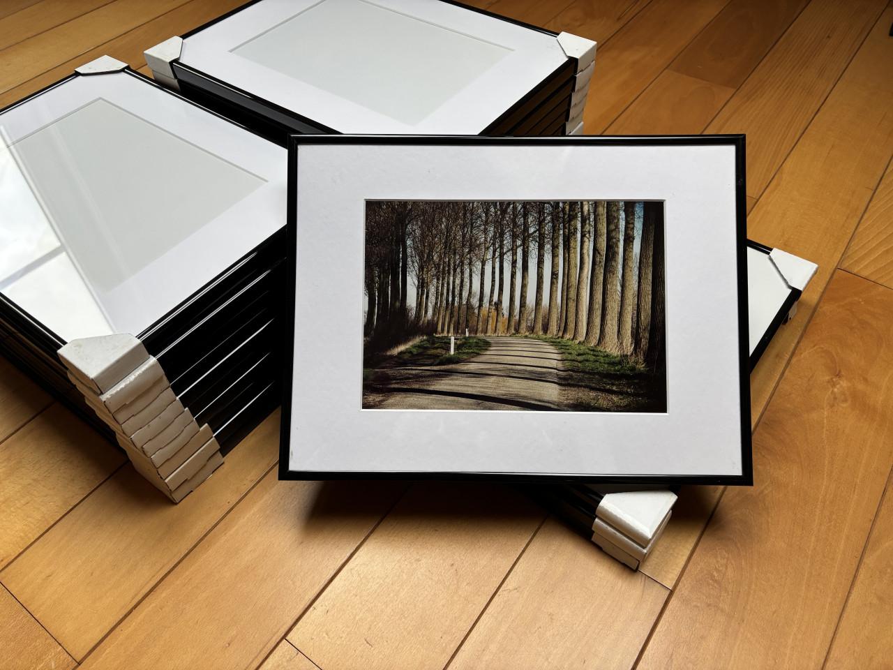 Fotolijsten ( zwart ) met passe-partout ( wit )