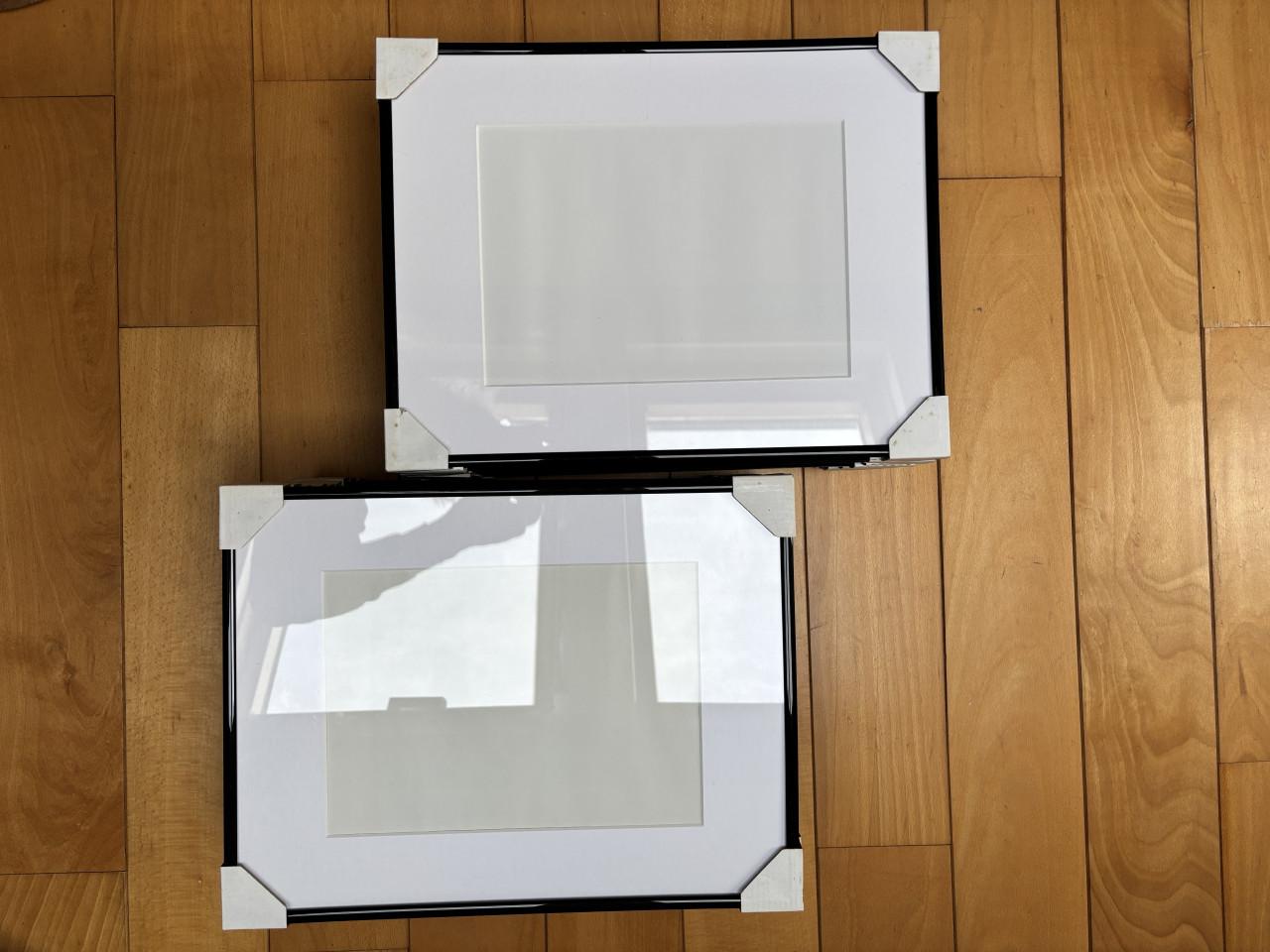 Fotolijsten ( zwart ) met passe-partout ( wit )