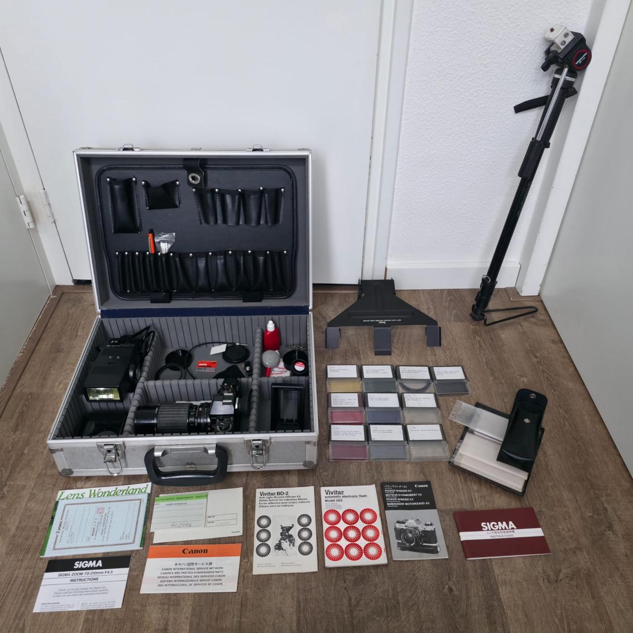 Canon A1 Spiegelreflexcamera met complete set accessoires