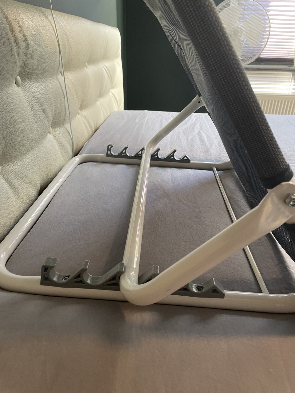 Inklapbare ruggesteun bed