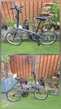 Te koop zwarte vouwfiets.