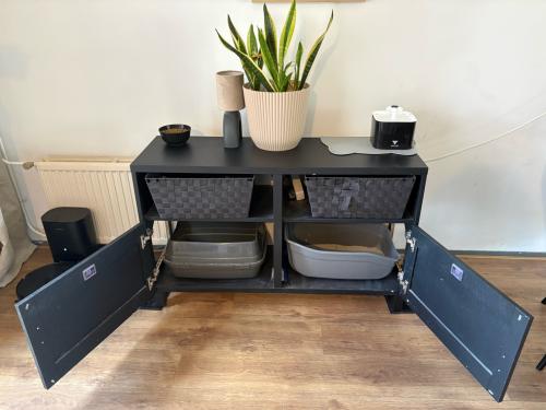 Dressoir met ruimte voor kattenbakken