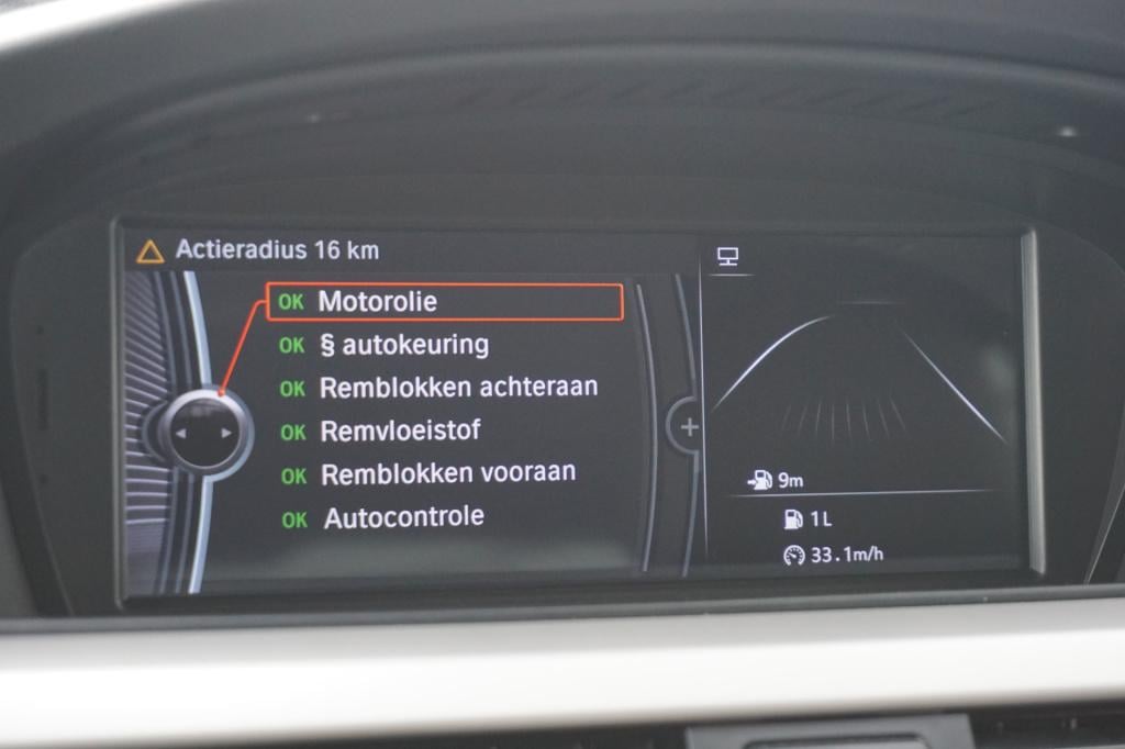 BMW 3-serie 316i business line airco / navi / cruise / carplay / parkeers. 