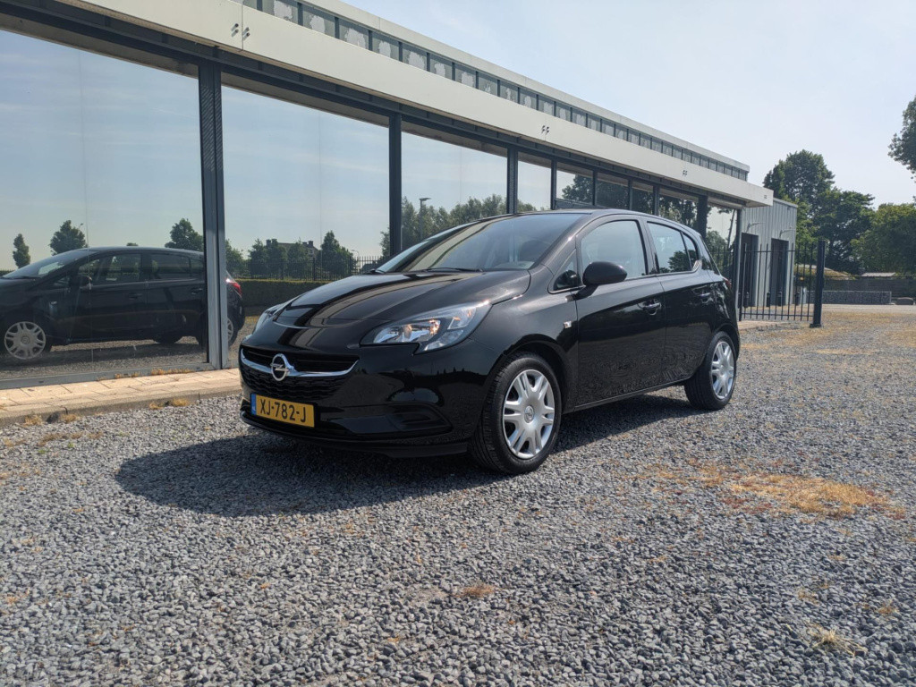 Opel Corsa 1.4 favourite | airco | cruise control | bluetooth