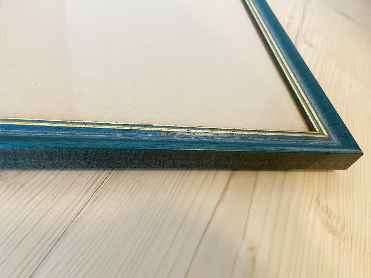 Mooie blauw/goud gekleurde fotolijsten