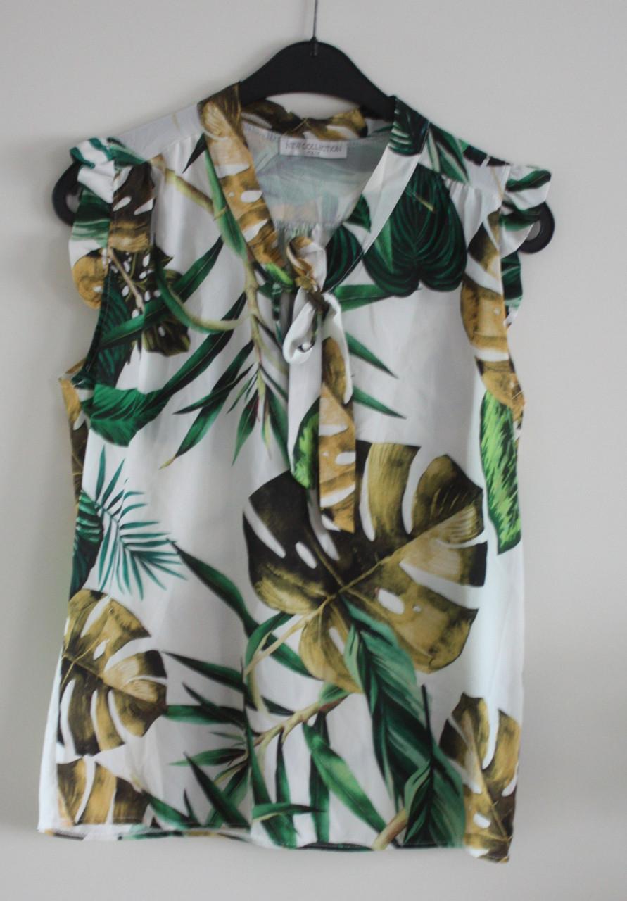 Top met bladeren print  maat 14