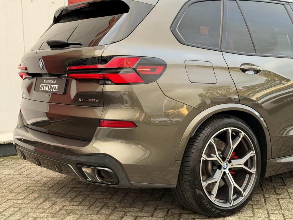 BMW X5 xdrive50e m-sport | pano | luchtvering | elek. trekhaak | rijklaar i